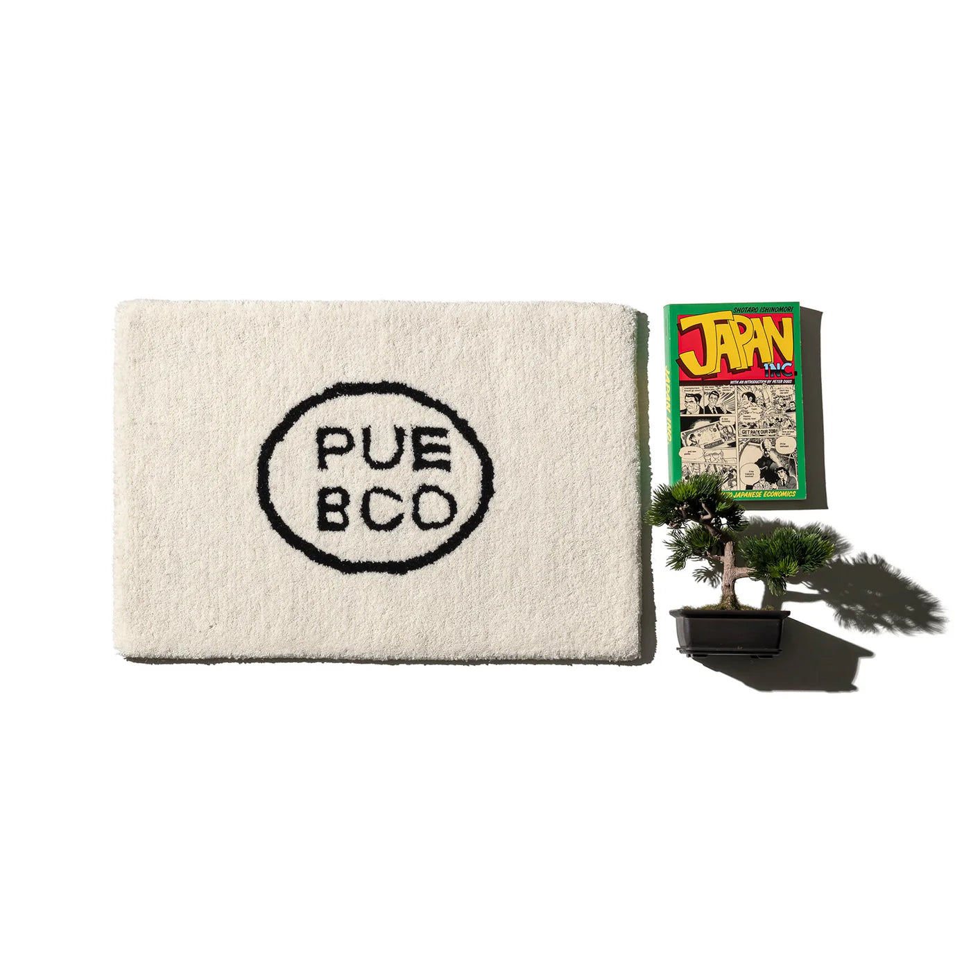 Tufted Mat / Puebco Logo