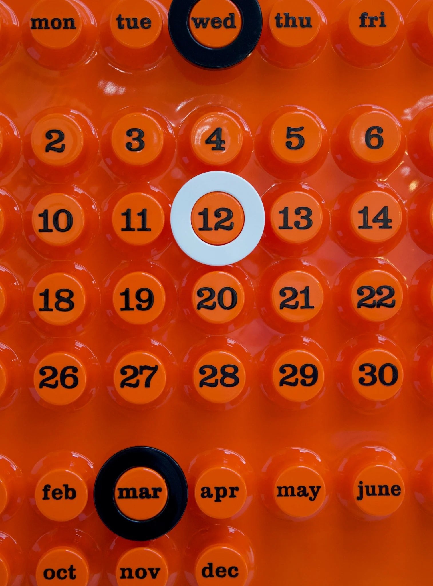 Otto's Corner Store - Orange Ring - A - Date Perpetual Calendar by Giorgio Della Beffa