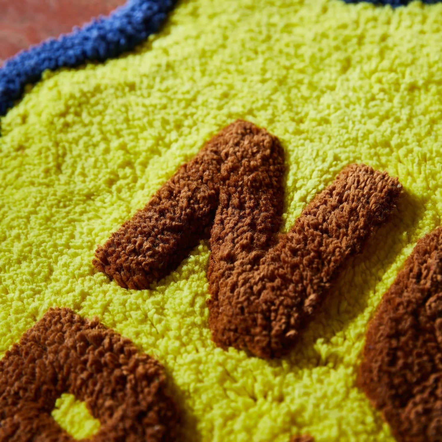Otto's Corner Store - Sage and Clare | Amalie Nudie Bath Mat Mini - Daffodil